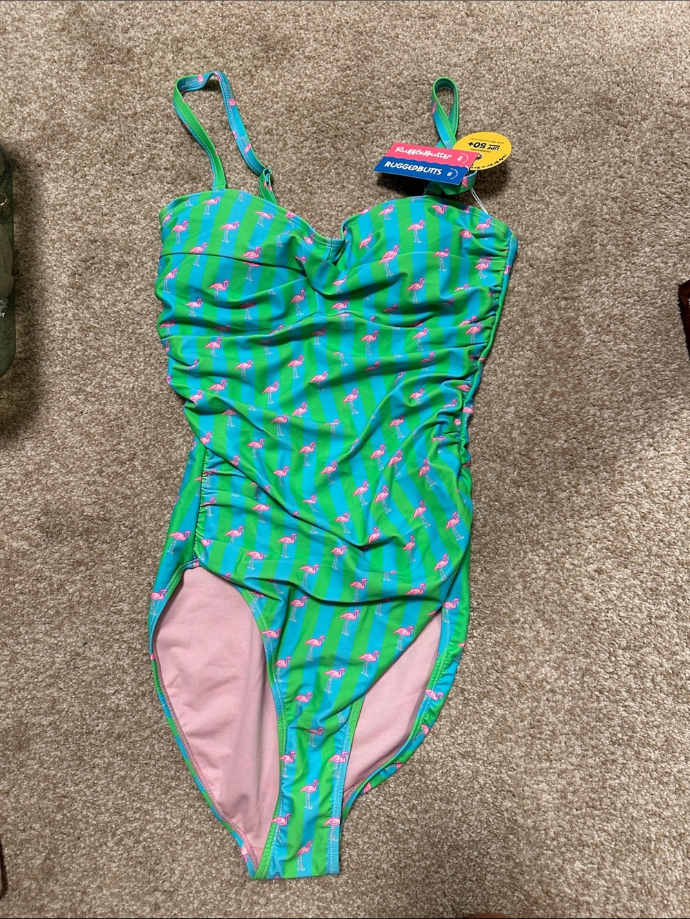 RuffleButts Green Striped One-Piece Swimsuit with Pink Flamingos
